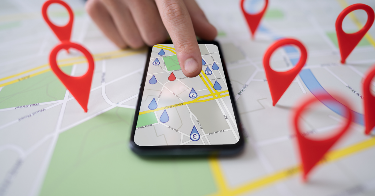 Map phone and red location icons on a map